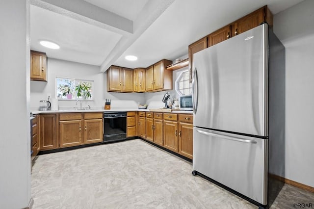 kitchen with beamed ceiling, dishwasher, sink, and stainless steel fridge