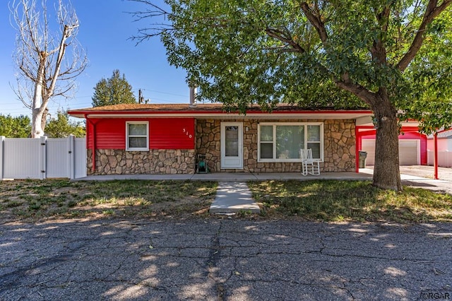 single story home with a garage