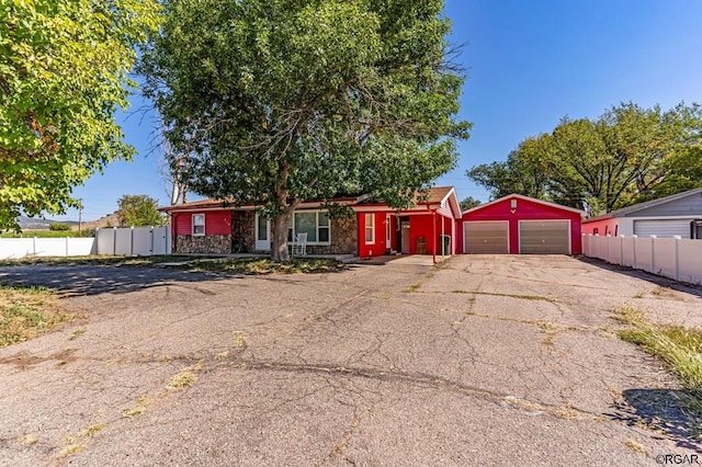 single story home with a garage