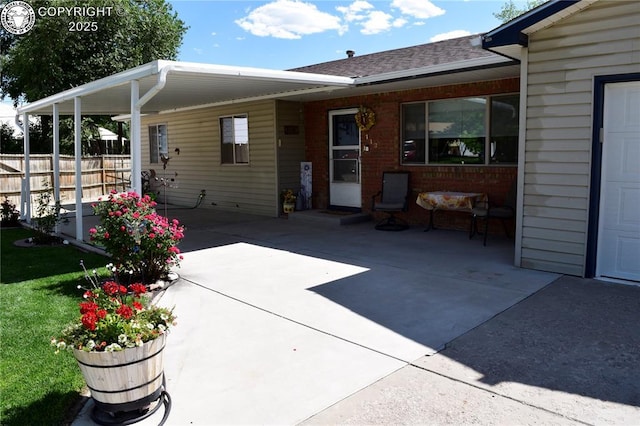113 Rio Grande Dr, Canon City, CO 81212 - view of patio / terrace featuring a carport and driveway