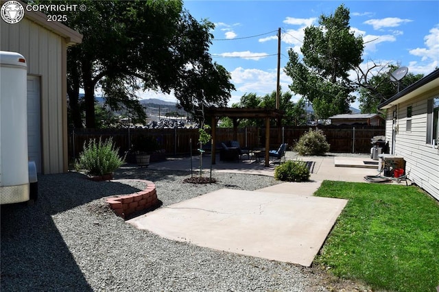 113 Rio Grande Dr, Canon City, CO 81212 - fenced backyard with a patio area and a pergola