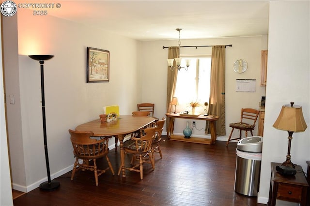113 Rio Grande Dr, Canon City, CO 81212 - dining area featuring dark wood-style flooring and baseboards