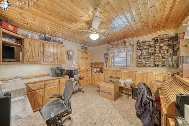 136 Beneaton Ln, Westcliffe, CO 81252 - carpeted office featuring wooden ceiling, a wainscoted wall, a ceiling fan, and wood walls