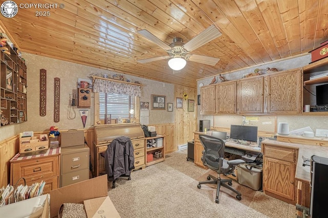 136 Beneaton Ln, Westcliffe, CO 81252 - office area featuring wood ceiling, a ceiling fan, light carpet, and a wainscoted wall