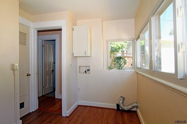 laundry room with plenty of natural light, dark hardwood / wood-style floors, and hookup for a washing machine