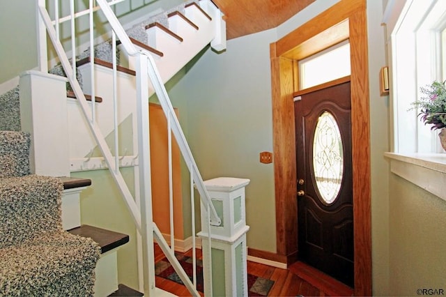 entryway featuring dark wood-type flooring