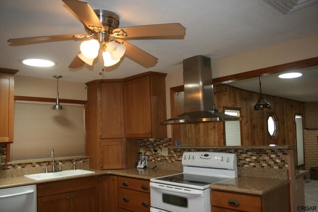 kitchen featuring decorative light fixtures, dishwasher, sink, island exhaust hood, and white electric range oven