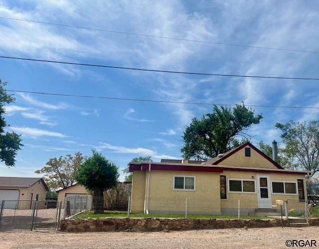 view of side of property with a garage