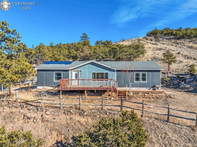 view of front of home featuring a deck