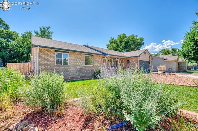 168 Willmoor Ct, Canon City, CO 81212 - ranch-style house featuring a garage and brick siding