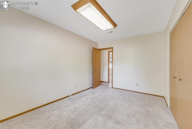 168 Willmoor Ct, Canon City, CO 81212 - unfurnished bedroom with light colored carpet and a closet