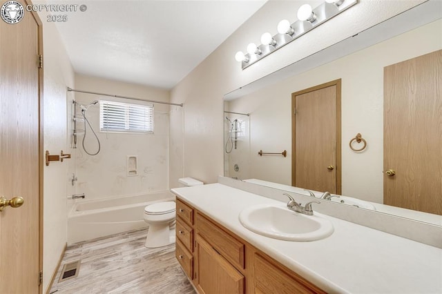 168 Willmoor Ct, Canon City, CO 81212 - bathroom with tub / shower combination, vanity, and wood finished floors