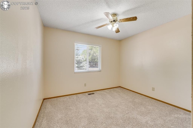 168 Willmoor Ct, Canon City, CO 81212 - carpeted empty room featuring a textured ceiling and a ceiling fan