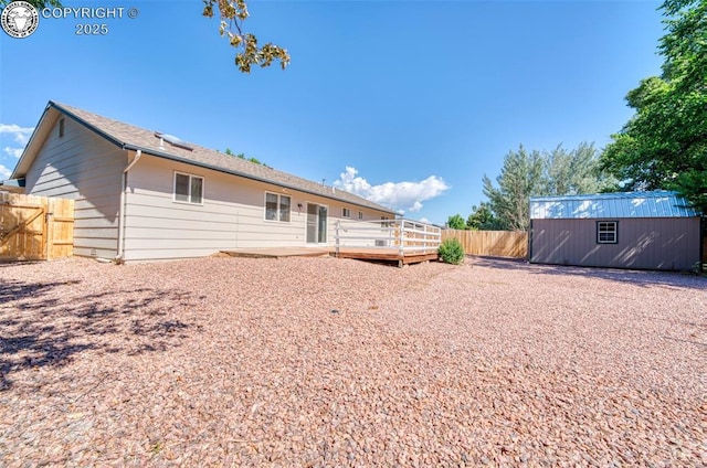 168 Willmoor Ct, Canon City, CO 81212 - rear view of property featuring a wooden deck and a shed