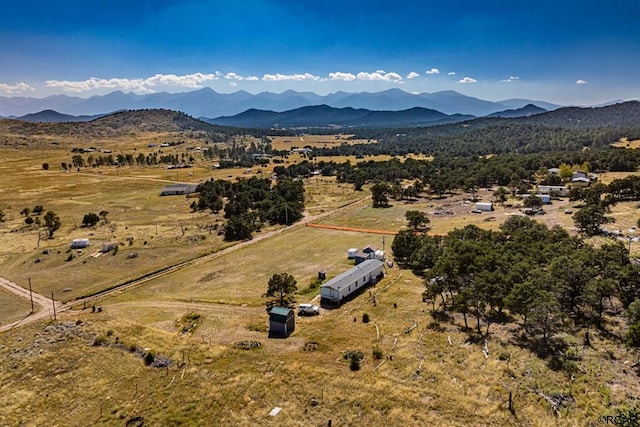 bird's eye view with a rural view and a mountain view