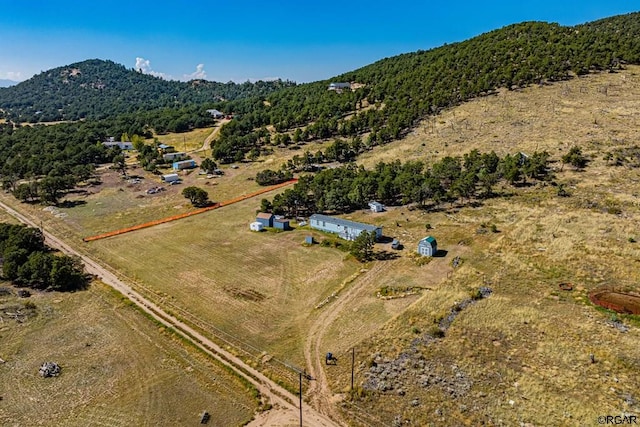 bird's eye view with a mountain view and a rural view