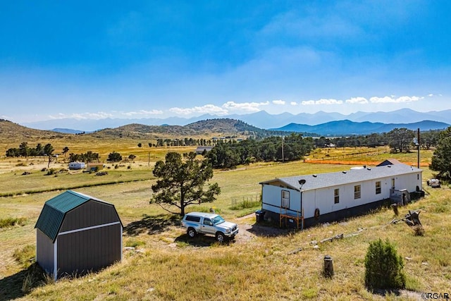 view of mountain feature featuring a rural view