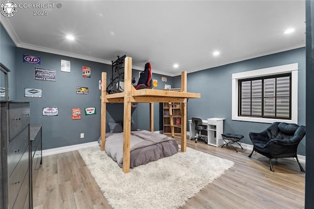 bedroom featuring ornamental molding, recessed lighting, light wood-style floors, and baseboards