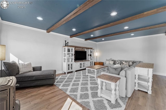 living room with baseboards, wood finished floors, beam ceiling, and recessed lighting