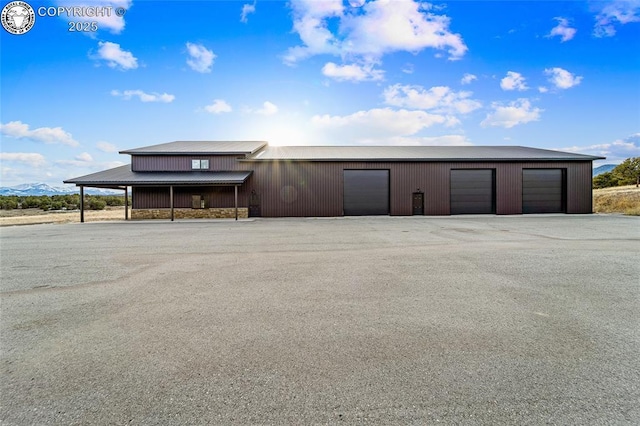 exterior space with a detached garage