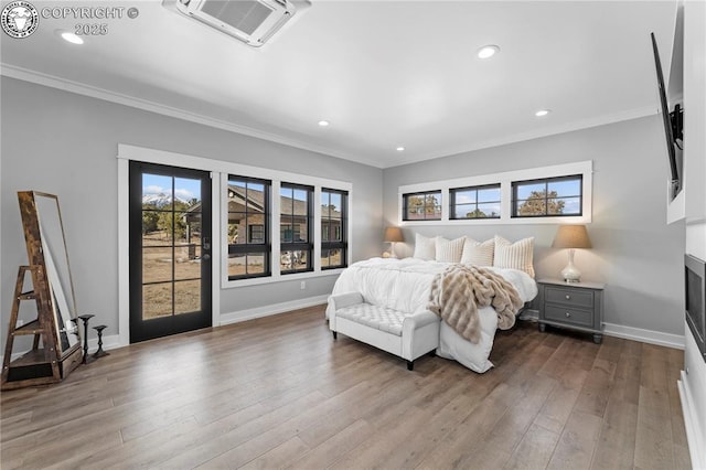 bedroom featuring recessed lighting, crown molding, baseboards, and wood finished floors