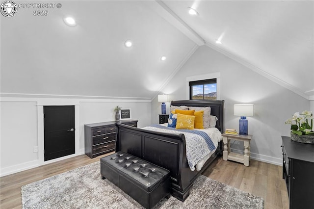 bedroom featuring vaulted ceiling, recessed lighting, wood finished floors, and baseboards