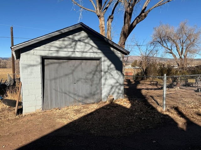 view of outbuilding featuring a garage