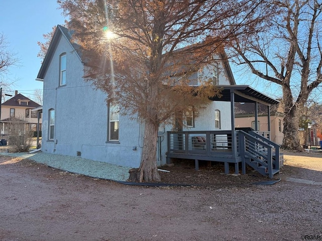 exterior space with a wooden deck