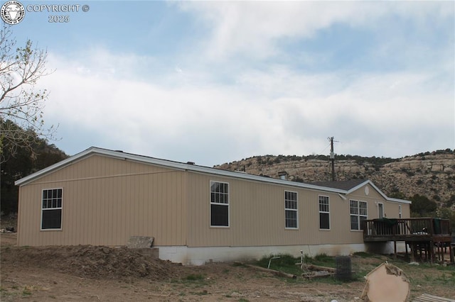 8 Cedar Ridge Rd, Williamsburg, CO 81226 - view of side of home with a deck