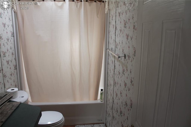8 Cedar Ridge Rd, Williamsburg, CO 81226 - bathroom featuring wallpapered walls, toilet, and shower / tub combo