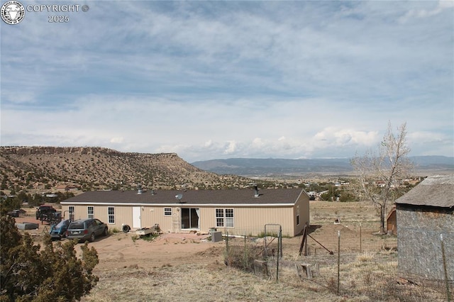 8 Cedar Ridge Rd, Williamsburg, CO 81226 - rear view of property featuring a mountain view