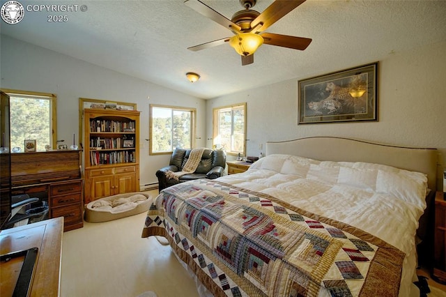 bedroom with a textured ceiling, vaulted ceiling, ceiling fan, and baseboard heating