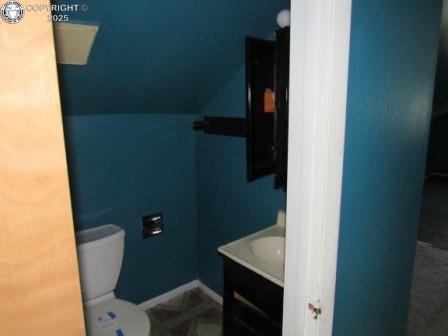 515 Mystic Ave, Canon City, CO 81212 - bathroom with vanity and lofted ceiling