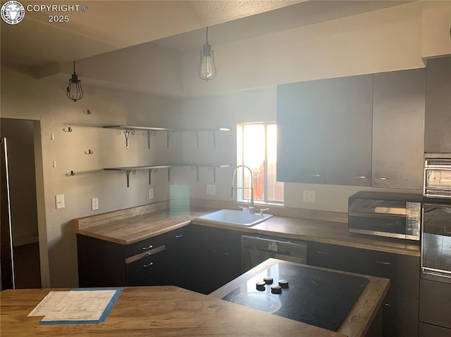 515 Mystic Ave, Canon City, CO 81212 - kitchen featuring black appliances, open shelves, and wood counters