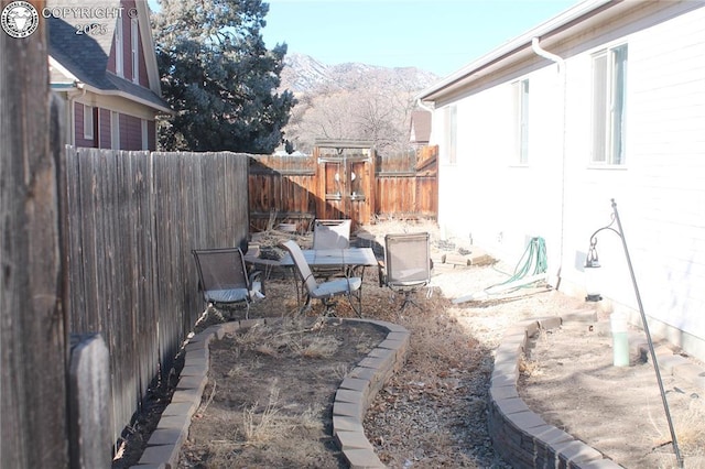 view of patio / terrace with a mountain view