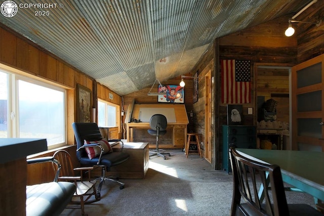 home office featuring wood walls and vaulted ceiling