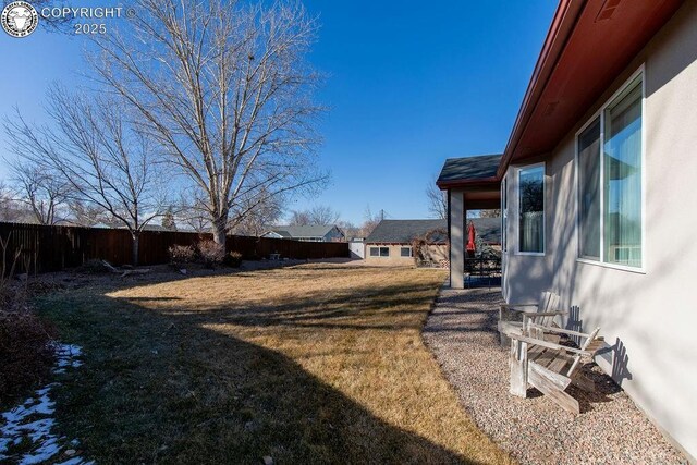 view of yard featuring a fenced backyard