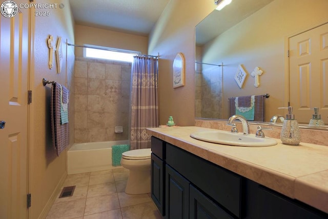 full bathroom with toilet, vanity, visible vents, tile patterned floors, and shower / bath combo with shower curtain