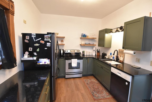 kitchen with dishwasher, sink, fridge, electric range, and light hardwood / wood-style flooring