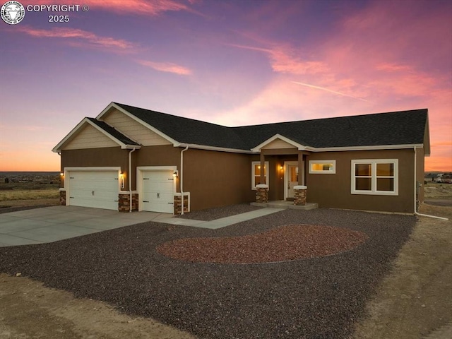 view of front of house with a garage