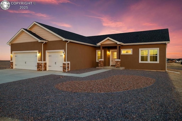 view of front of home featuring a garage