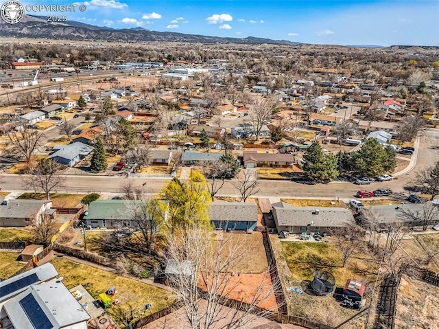 birds eye view of property featuring a residential view and a mountain view