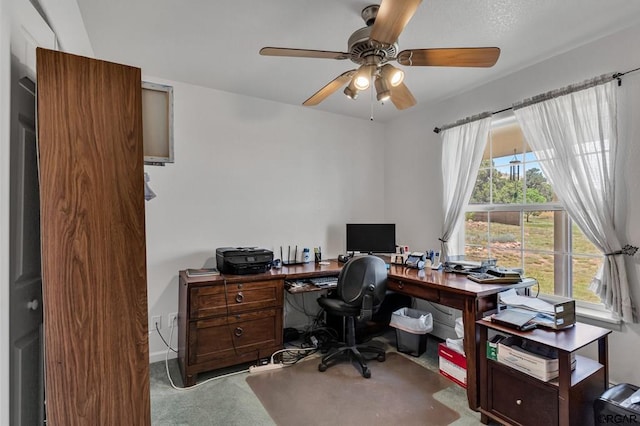 office area featuring carpet floors and ceiling fan