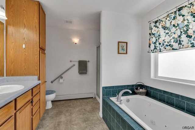 bathroom featuring vanity, a baseboard heating unit, toilet, and tiled tub