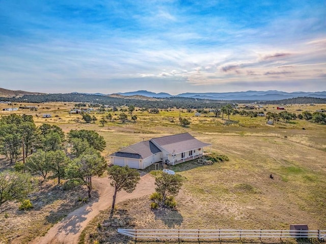 aerial view with a mountain view and a rural view