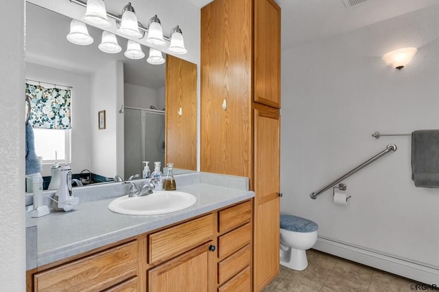 bathroom with vanity, a baseboard heating unit, toilet, and walk in shower