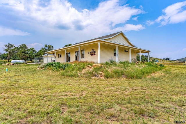 exterior space with a front lawn