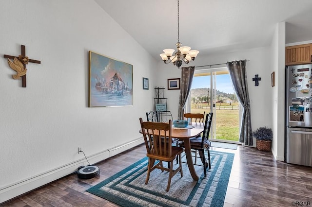 dining space with an inviting chandelier, lofted ceiling, dark hardwood / wood-style floors, and a baseboard heating unit