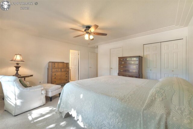 355 Antero Dr, Canon City, CO 81212 - carpeted bedroom with ornamental molding, a closet, and a ceiling fan