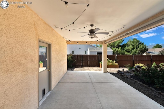355 Antero Dr, Canon City, CO 81212 - fenced backyard with a patio area and ceiling fan